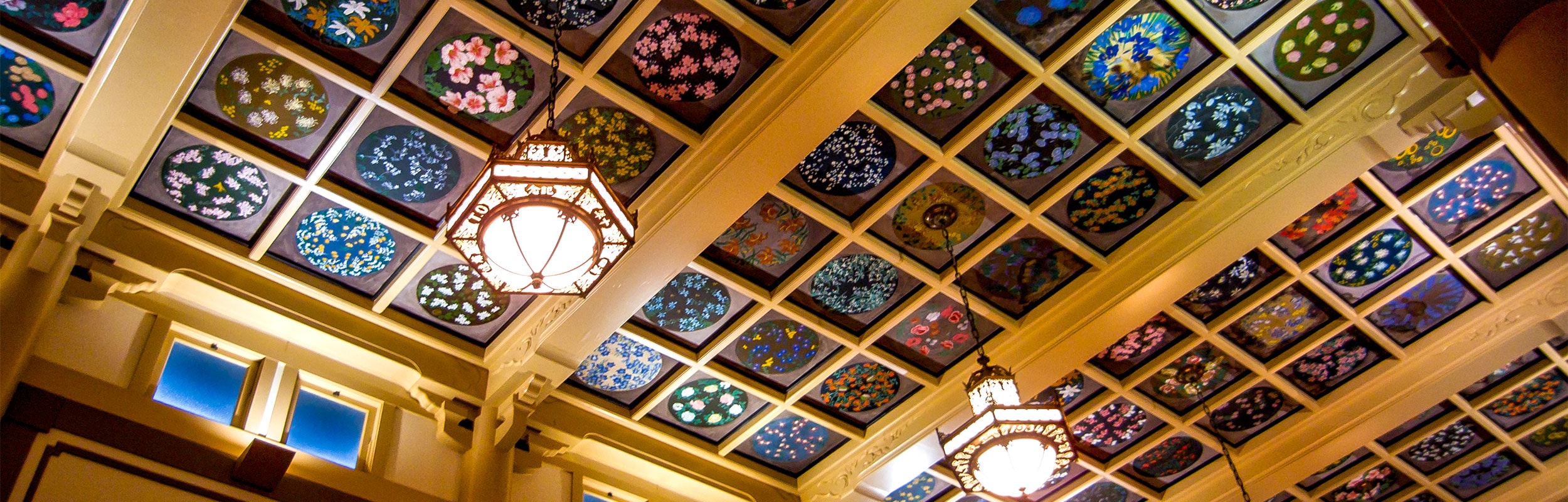 Painted ceiling tiles in the MCC sanctuary