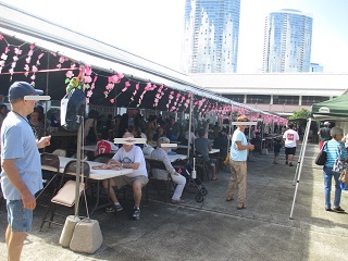 Festival tents and community gathering — photo courtesy of LeiHawaii